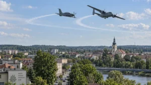 Ilustracja wojskowych samolotów szkoleniowych nad obszarem miejskim